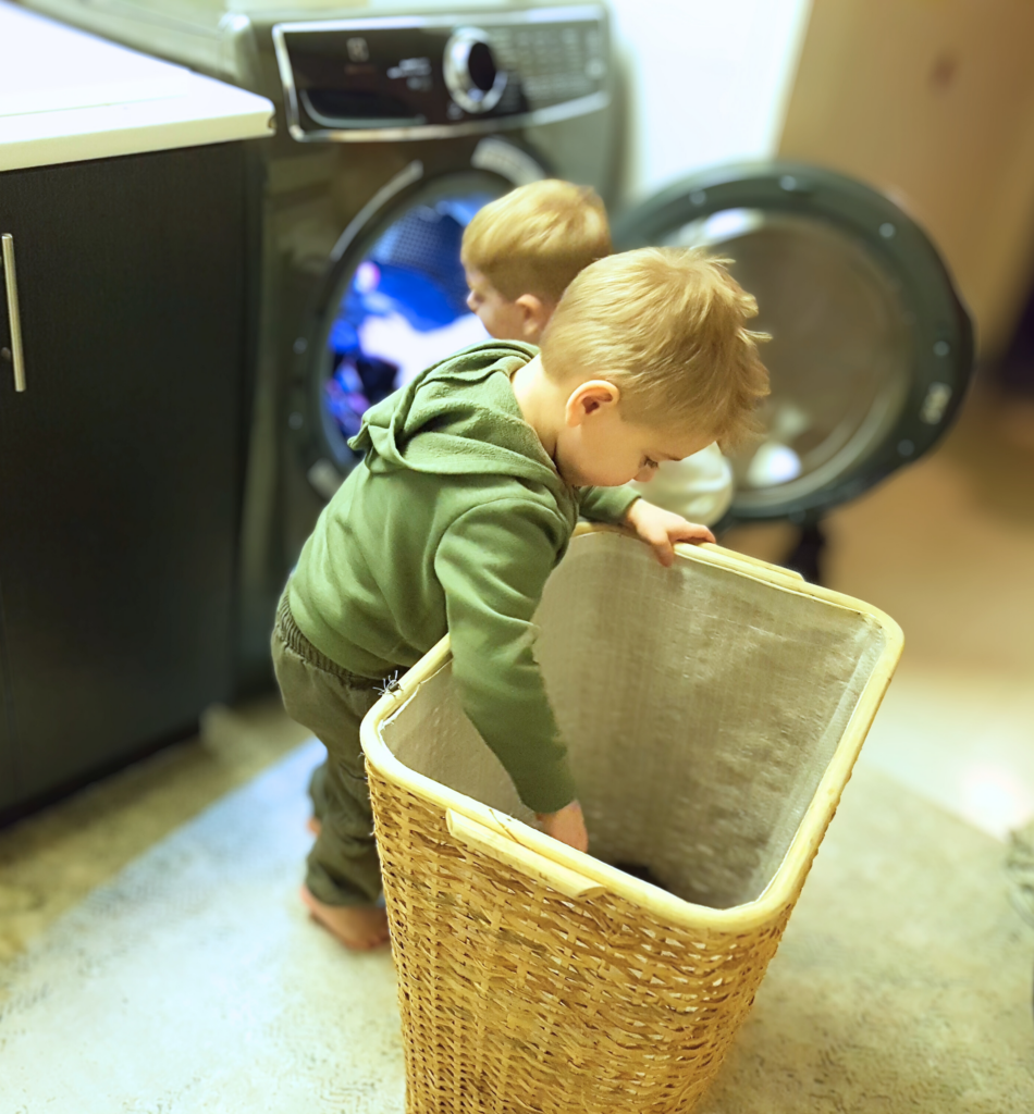 Twins in a Montessori Home laundry