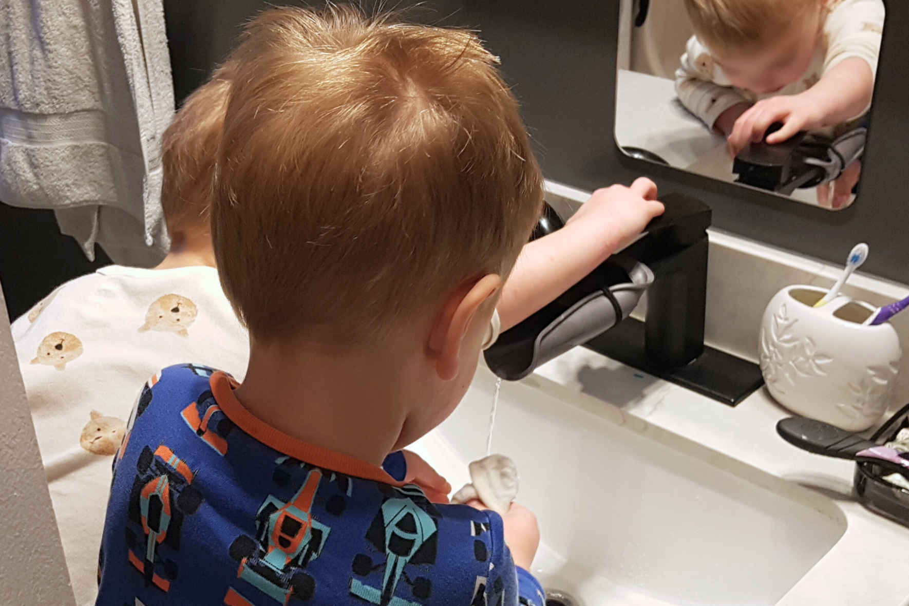 Twins using Montessori Bathroom at Home